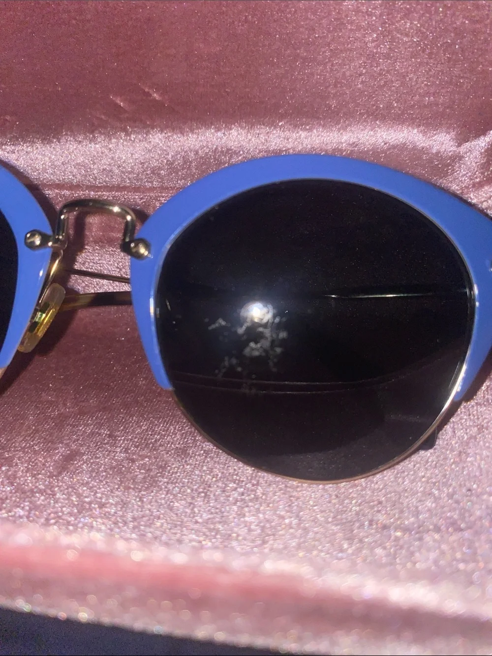 Authentic Miu Miu women’s Blue Round Metal-Trim Sunglasses